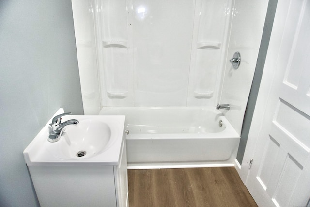 10 Fleming St, Waterbury, CT 06710 - full bathroom featuring wood finished floors, bathtub / shower combination, and vanity