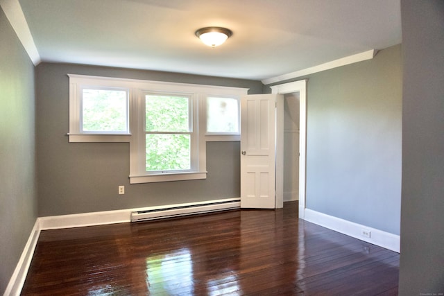 10 Fleming St, Waterbury, CT 06710 - unfurnished bedroom with a baseboard radiator, dark wood finished floors, and baseboards