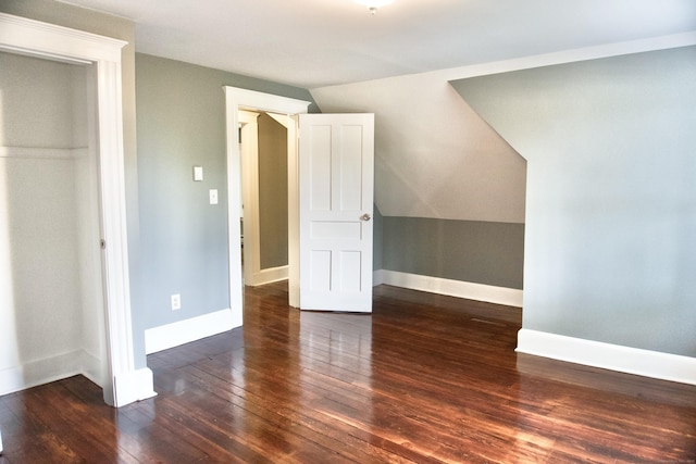 10 Fleming St, Waterbury, CT 06710 - unfurnished bedroom with hardwood / wood-style floors, vaulted ceiling, baseboards, and a closet