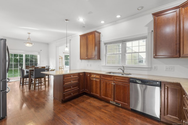1-1/2 Colony St, Norwalk, CT 06851 - kitchen featuring stainless steel appliances, a sink, a peninsula, crown molding, and dark wood-type flooring