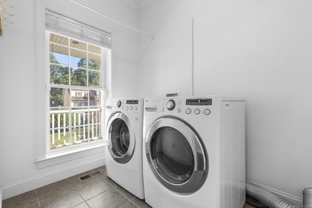 1-1/2 Colony St, Norwalk, CT 06851 - laundry area featuring separate washer and dryer and baseboards