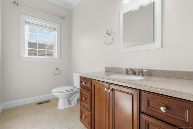 1-1/2 Colony St, Norwalk, CT 06851 - bathroom with vanity, tile patterned floors, toilet, ornamental molding, and baseboards