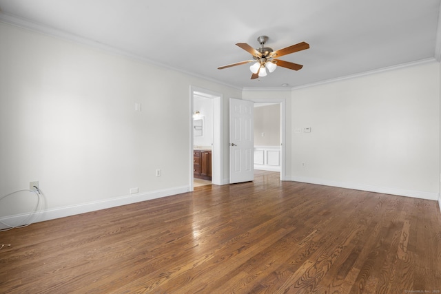 1-1/2 Colony St, Norwalk, CT 06851 - spare room with ceiling fan, ornamental molding, dark wood-style flooring, and baseboards