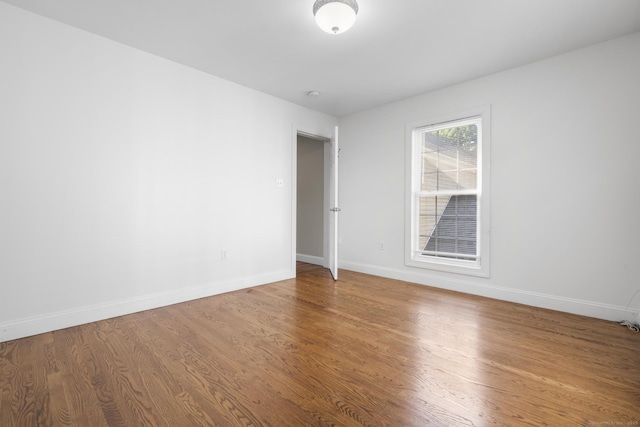 1-1/2 Colony St, Norwalk, CT 06851 - spare room featuring wood finished floors and baseboards