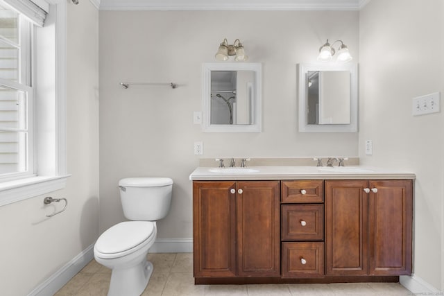 1-1/2 Colony St, Norwalk, CT 06851 - full bathroom with double vanity, baseboards, toilet, tile patterned flooring, and crown molding