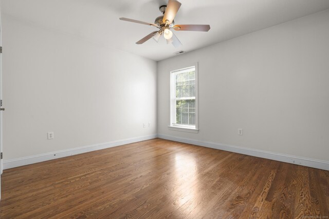 1-1/2 Colony St, Norwalk, CT 06851 - empty room featuring wood finished floors, baseboards, and ceiling fan