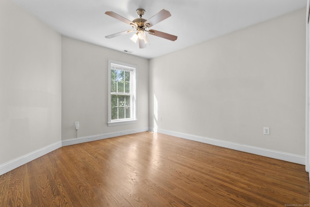 1-1/2 Colony St, Norwalk, CT 06851 - spare room featuring wood finished floors, baseboards, and a ceiling fan