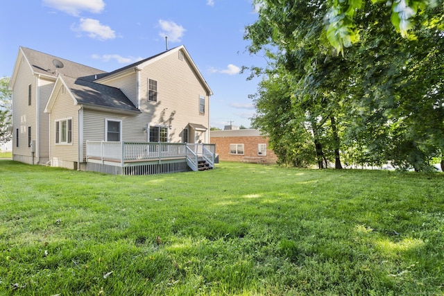 1-1/2 Colony St, Norwalk, CT 06851 - back of house featuring a lawn and a wooden deck