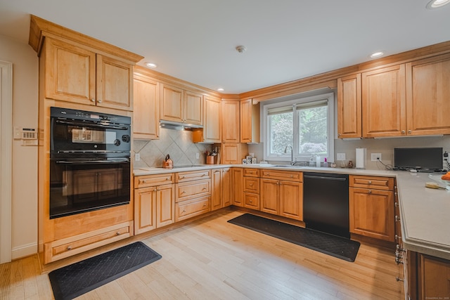 5 Stone Wall Ln, Woodbridge, CT 06525 - kitchen with black appliances, a sink, light wood-style floors, light countertops, and recessed lighting