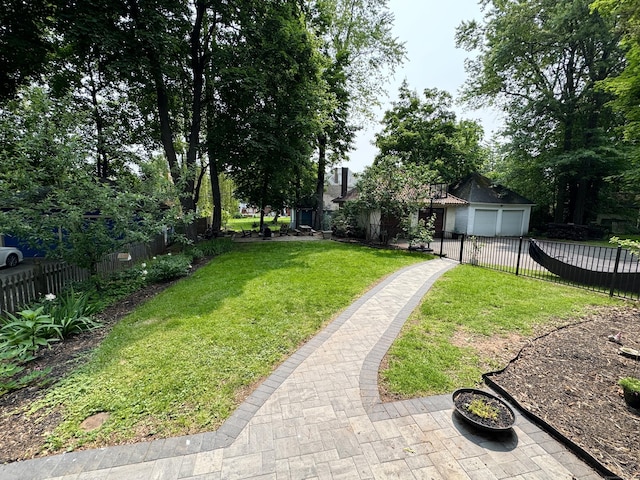160 Kenyon St, Hartford, CT 06105 - view of yard with a garage and driveway