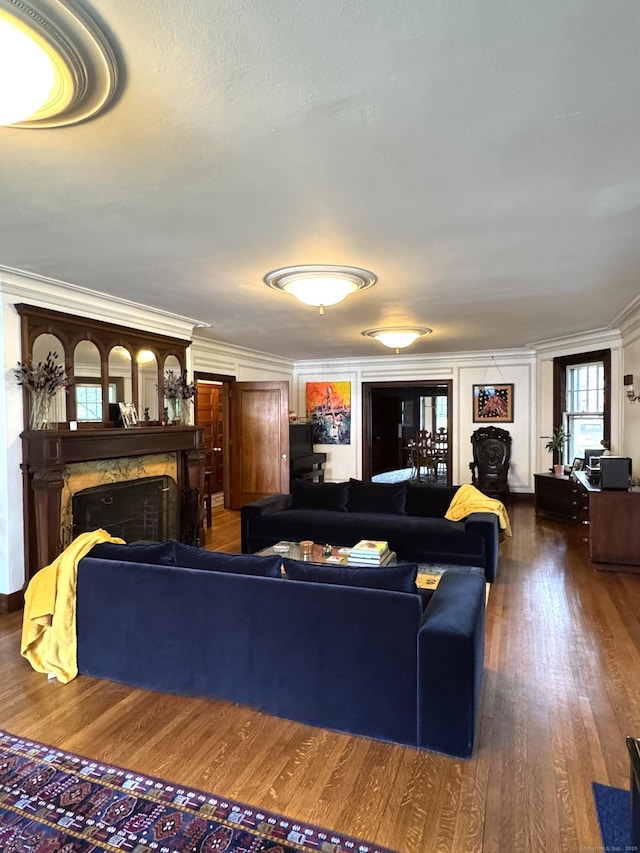 160 Kenyon St, Hartford, CT 06105 - living area featuring a fireplace, wood finished floors, and ornamental molding