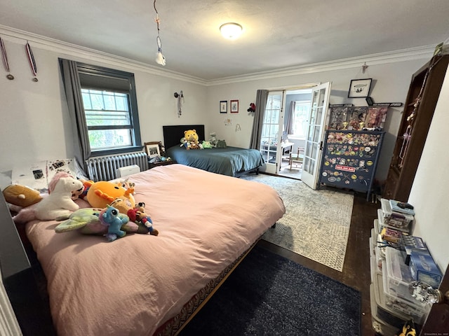160 Kenyon St, Hartford, CT 06105 - bedroom with multiple windows, crown molding, radiator, and wood finished floors
