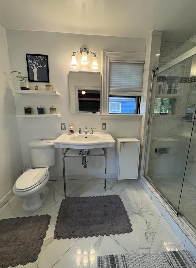 160 Kenyon St, Hartford, CT 06105 - bathroom with marble look tiles, baseboards, a shower stall, and toilet