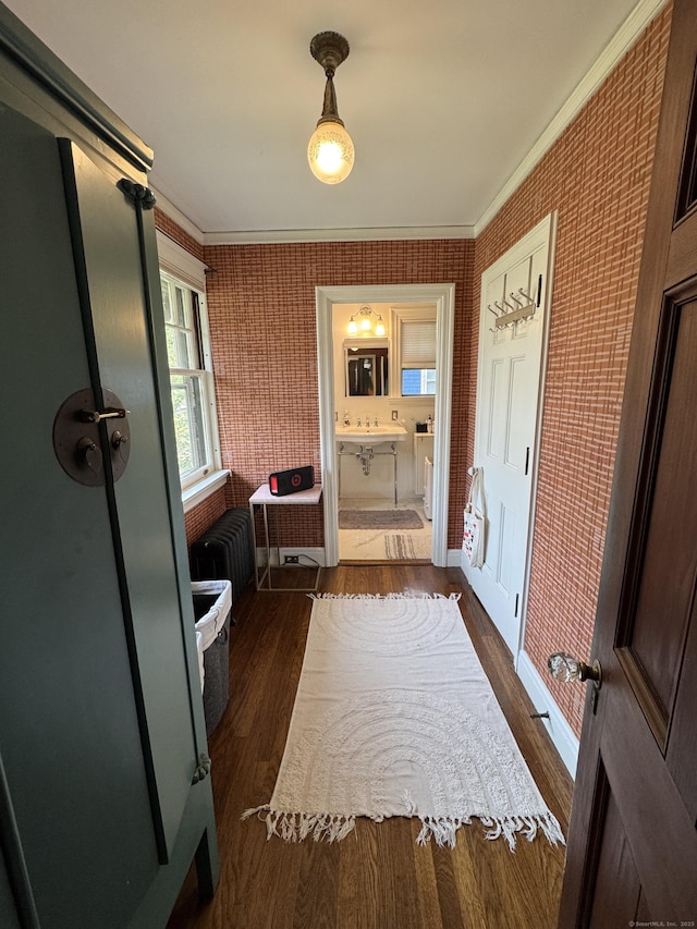 160 Kenyon St, Hartford, CT 06105 - hall with dark wood finished floors, ornamental molding, and wallpapered walls
