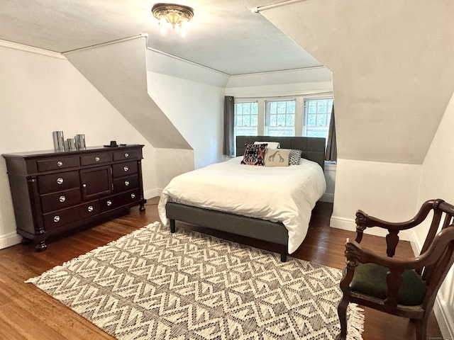 160 Kenyon St, Hartford, CT 06105 - bedroom featuring dark wood-style flooring, baseboards, and lofted ceiling