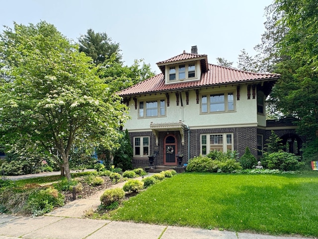 160 Kenyon St, Hartford, CT 06105 - mediterranean / spanish home featuring stucco siding, a chimney, and a front lawn
