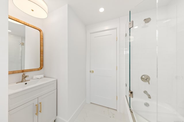 105 Blake Dr, Fairfield, CT 06824 - full bath featuring marble finish floors, shower / bathtub combination, vanity, baseboards, and recessed lighting