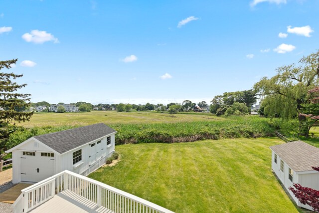 105 Blake Dr, Fairfield, CT 06824 - view of grassy yard with an outbuilding and a garage