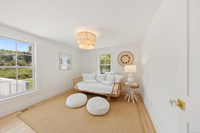 105 Blake Dr, Fairfield, CT 06824 - sitting room with wood finished floors and baseboards
