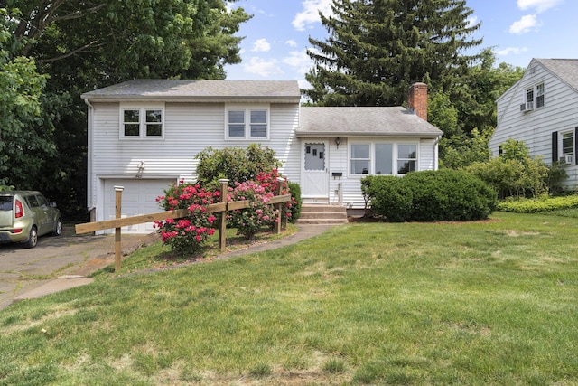 26 Caroldon Rd, Middletown, CT 06457 - split level home featuring a chimney, a garage, a front yard, roof with shingles, and driveway