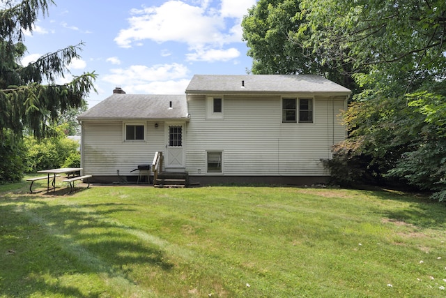 26 Caroldon Rd, Middletown, CT 06457 - back of house with a yard and a chimney