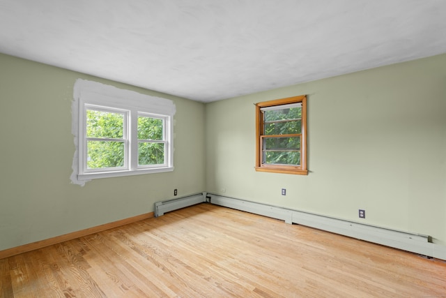 26 Caroldon Rd, Middletown, CT 06457 - unfurnished room with a baseboard radiator and wood finished floors