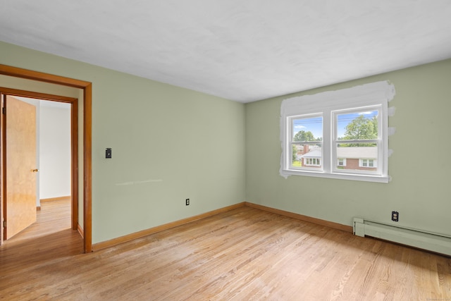 26 Caroldon Rd, Middletown, CT 06457 - spare room with a baseboard radiator and light wood-type flooring