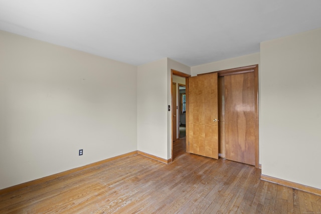 26 Caroldon Rd, Middletown, CT 06457 - unfurnished bedroom featuring light wood-type flooring and a closet