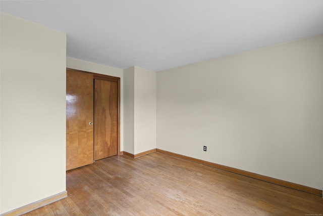 26 Caroldon Rd, Middletown, CT 06457 - unfurnished bedroom featuring light wood-style floors and a closet