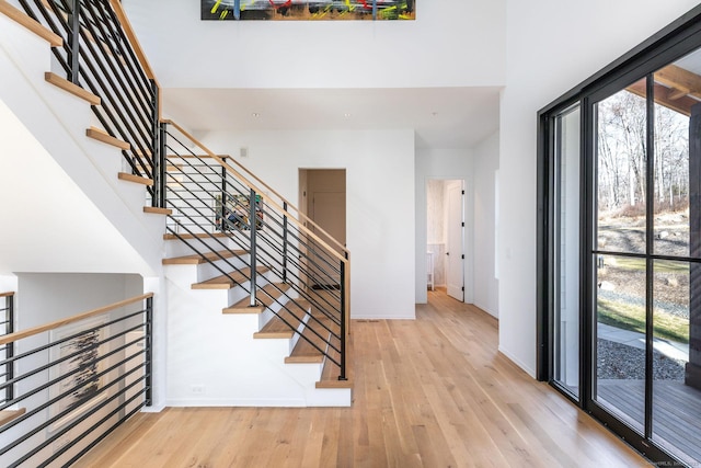 4 Vona Way, Newtown, CT 06470 - entryway with plenty of natural light, hardwood / wood-style flooring, a towering ceiling, and stairway