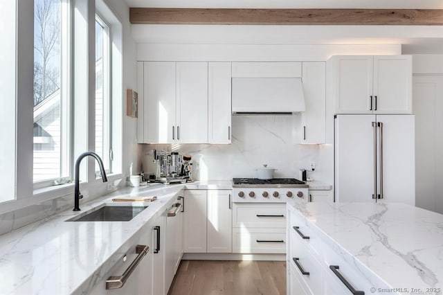 4 Vona Way, Newtown, CT 06470 - kitchen featuring range hood, high end fridge, white cabinets, light stone countertops, and gas stovetop