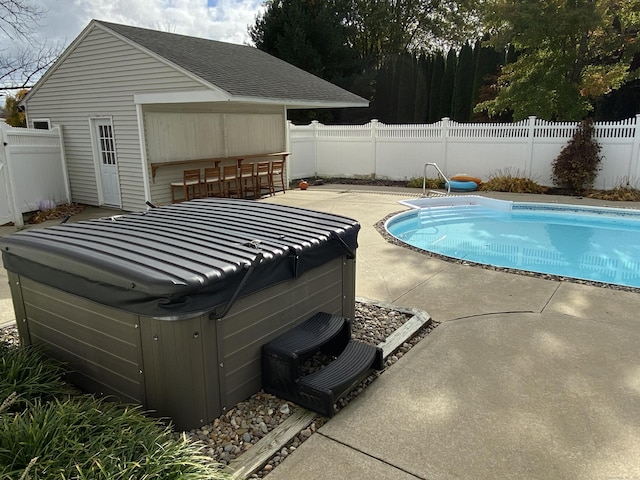 29 Meadowbrook Dr, Brooklyn, CT 06234 - view of pool with a hot tub, a patio, and a fenced backyard