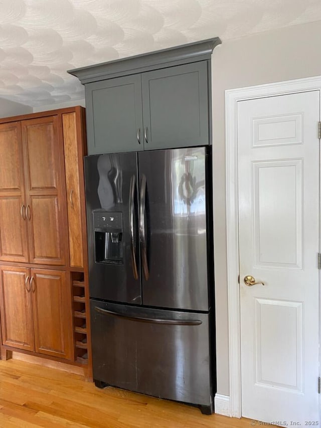 29 Meadowbrook Dr, Brooklyn, CT 06234 - kitchen with refrigerator with ice dispenser, light wood-style flooring, and brown cabinets