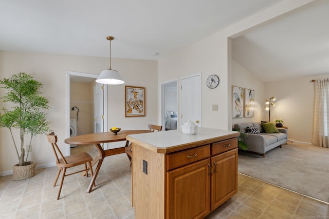 7 Rose Ct, East Windsor, CT 06088 - kitchen with light countertops, pendant lighting, a center island, vaulted ceiling, and open floor plan