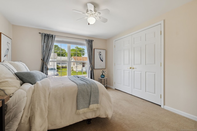 7 Rose Ct, East Windsor, CT 06088 - bedroom featuring light carpet, baseboards, a closet, and a ceiling fan
