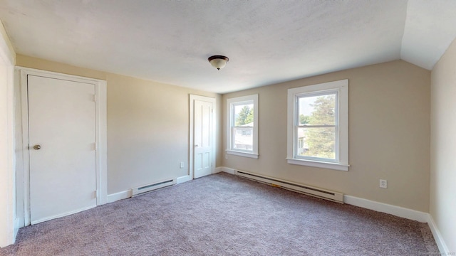 24 N St, Meriden, CT 06451 - unfurnished room with a baseboard heating unit, carpet floors, a baseboard radiator, baseboards, and vaulted ceiling