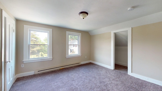 24 N St, Meriden, CT 06451 - unfurnished bedroom with baseboard heating, carpet flooring, baseboards, and vaulted ceiling