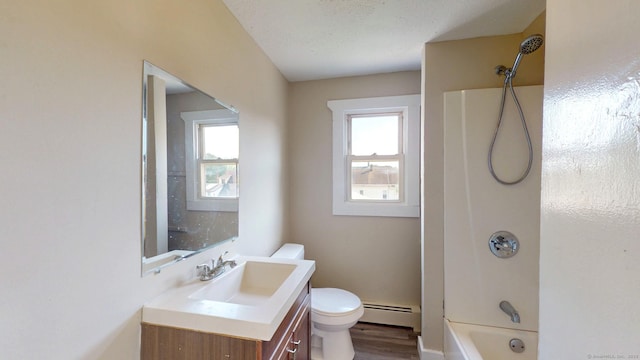 24 N St, Meriden, CT 06451 - bathroom featuring baseboard heating, toilet, vanity, and plenty of natural light