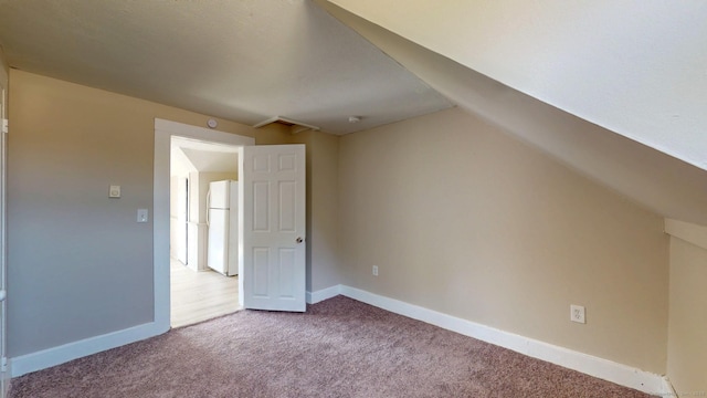 24 N St, Meriden, CT 06451 - additional living space with carpet, lofted ceiling, and baseboards