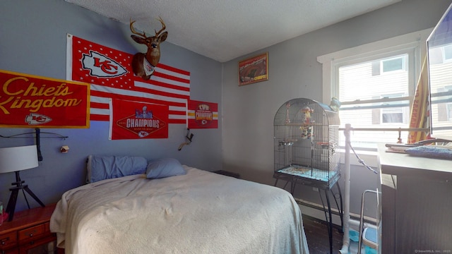 24 N St, Meriden, CT 06451 - bedroom with wood finished floors and a textured ceiling