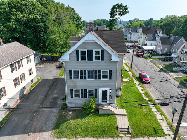 24 N St, Meriden, CT 06451 - view of front of property with a residential view, asphalt driveway, and uncovered parking