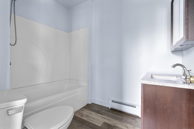 728 Quinnipiac Ave, New Haven, CT 06513 - full bathroom featuring a baseboard heating unit, toilet, vanity, wood finished floors, and tub / shower combination