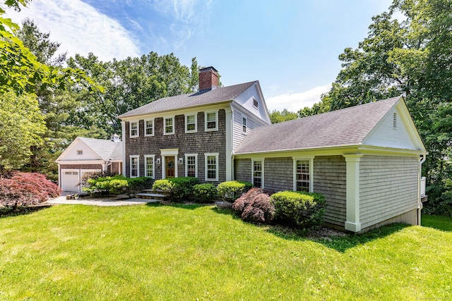 59 Davids Hill Rd, Woodbury, CT 06798 - colonial home with a chimney, a shingled roof, a front yard, and a garage