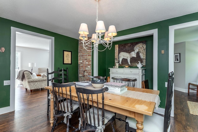 59 Davids Hill Rd, Woodbury, CT 06798 - dining area with a chandelier and dark wood-style flooring