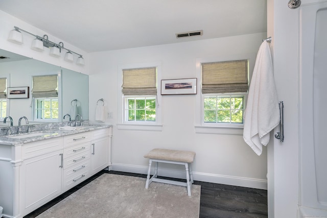 59 Davids Hill Rd, Woodbury, CT 06798 - full bath featuring double vanity and wood finished floors