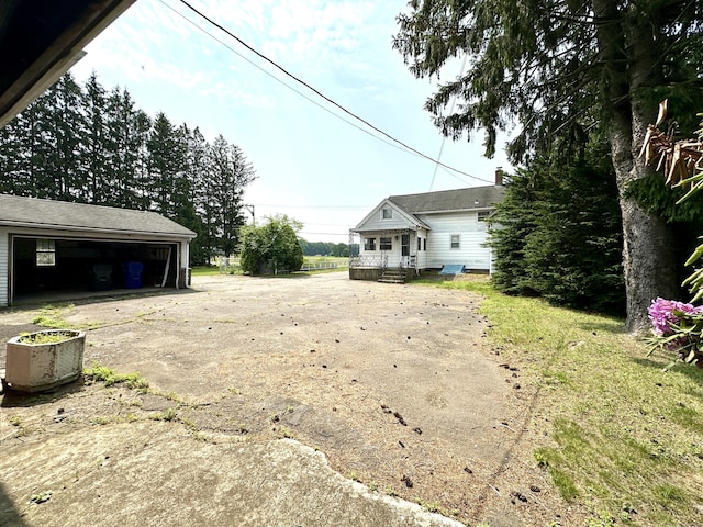 11 Abbe Rd, East Windsor, CT 06088 - view of yard with an outdoor structure and a garage