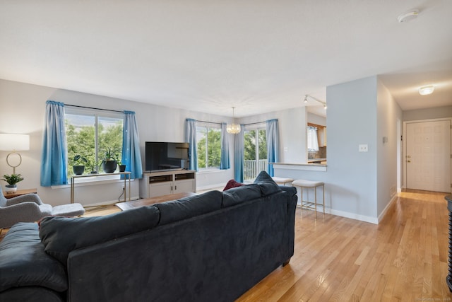 66 Staffordshire Commons Dr Unit 66, Wallingford, CT 06492 - living room with light wood-type flooring and baseboards