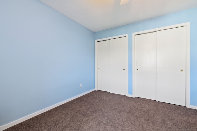 66 Staffordshire Commons Dr Unit 66, Wallingford, CT 06492 - unfurnished bedroom with multiple closets, carpet, and baseboards