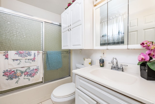 full bathroom with vanity and combined bath / shower with glass door