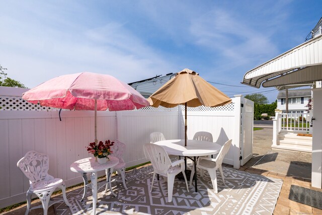 view of patio featuring outdoor dining space